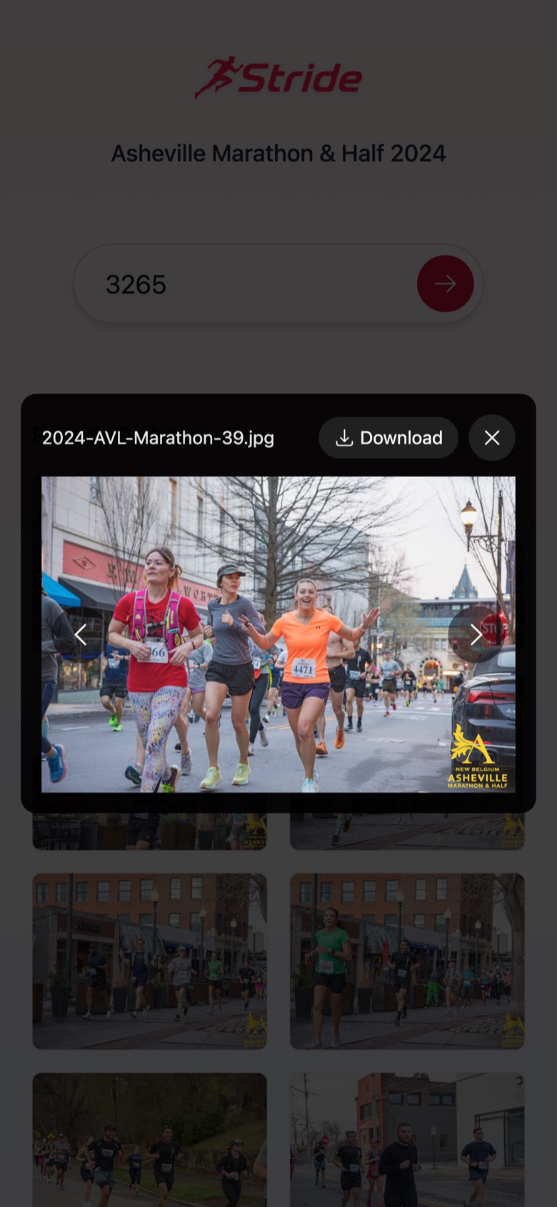 A runner viewing their race photo on Stride on their phone